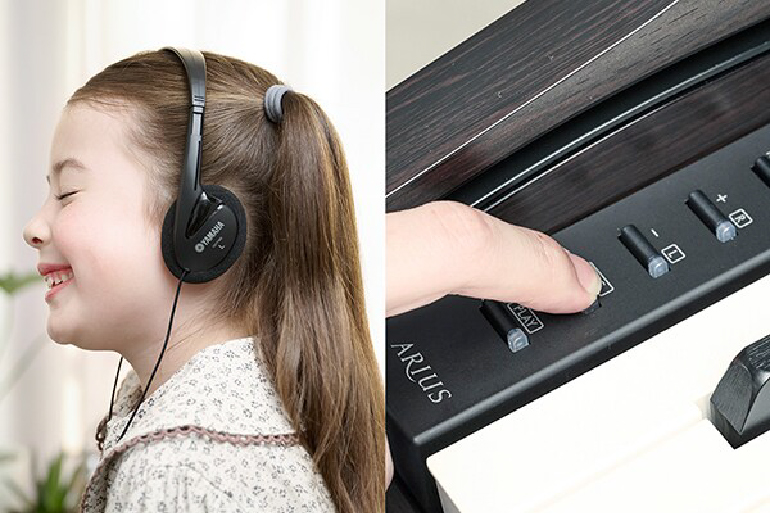 Young girl wearing over-ear headphones smiling as she listens to music; right side shows a finger pressing a control button on a piano keyboard.