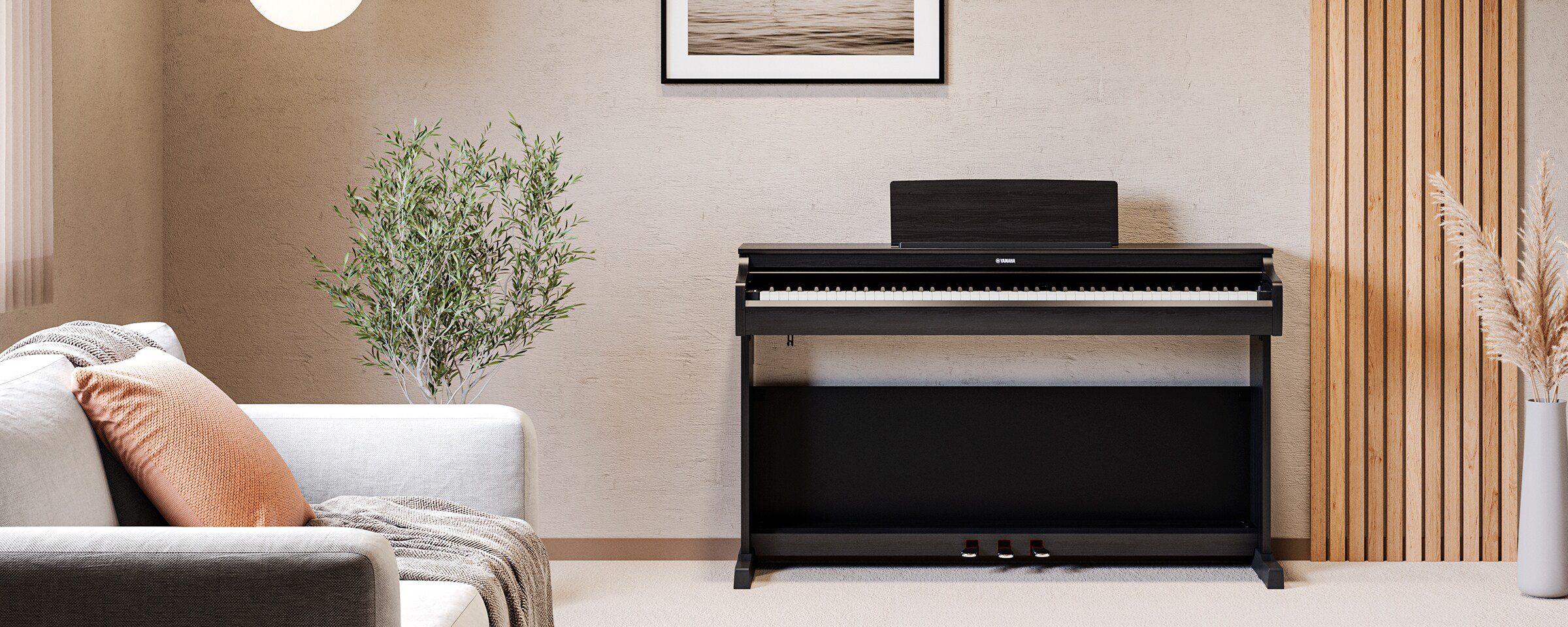 Black upright piano centered in a modern living room with a plant, sofa, and wooden slat divider nearby.