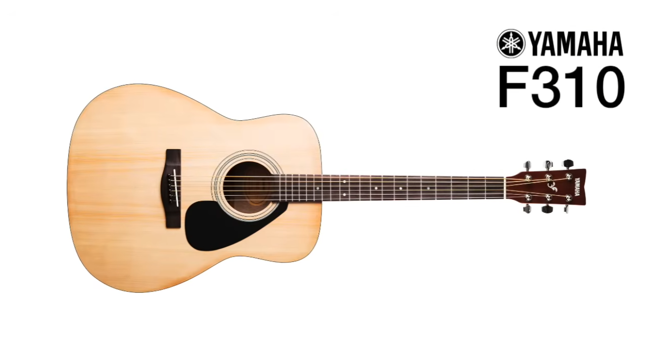 Yamaha F310 acoustic guitar with a natural pine body and dark pickguard, full view from the left side showing the neck and headstock logo.
