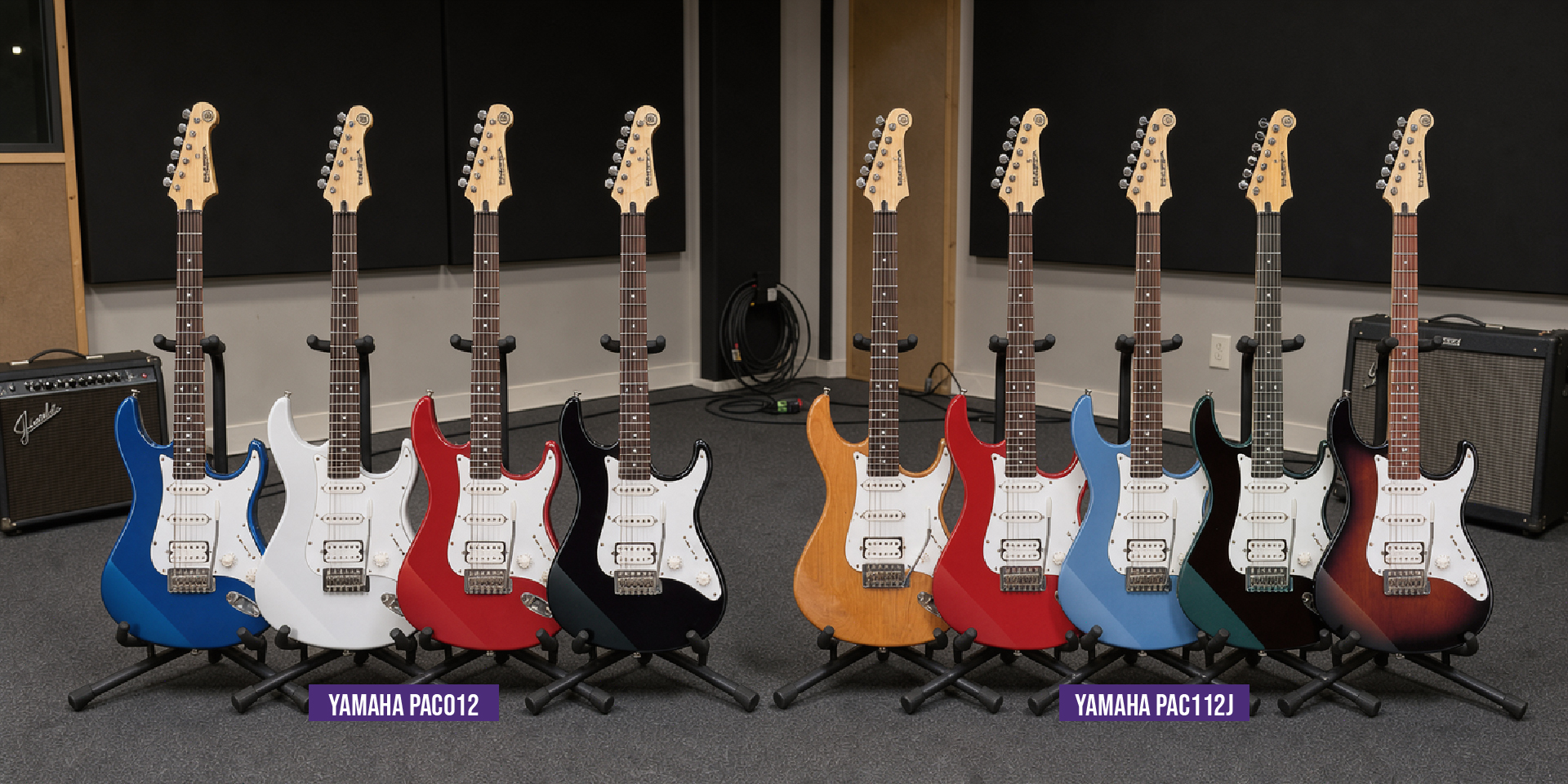 Row of twelve Yamaha electric guitars on stands in a music studio, showcasing finishes from blue and white to red, black, natural wood, and sunburst with amplifiers in the background.
