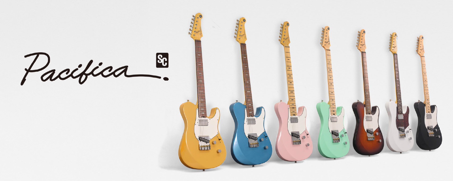 Row of eight Pacifica electric guitars in pastel colors lined up against a white wall with the Pacfica logo on the left side.